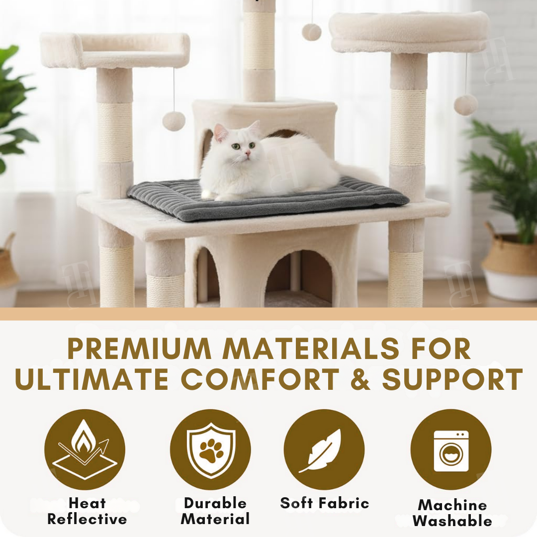 Cat resting on the self-warming mat on a cat tree